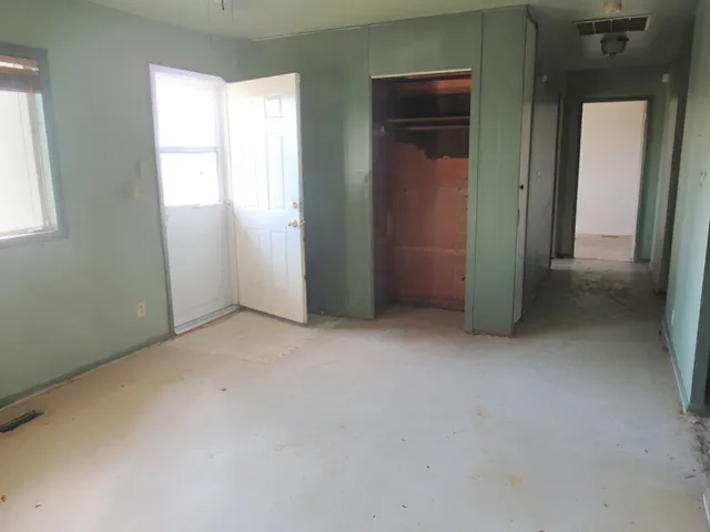 an empty room with windows