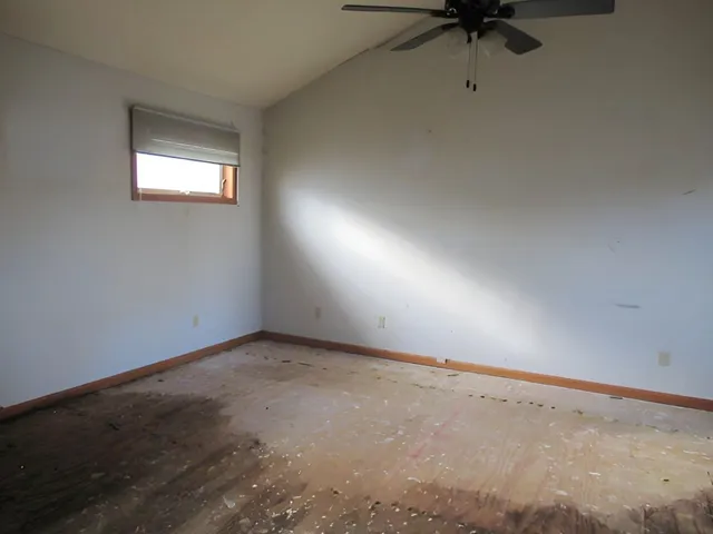 an empty room with a window