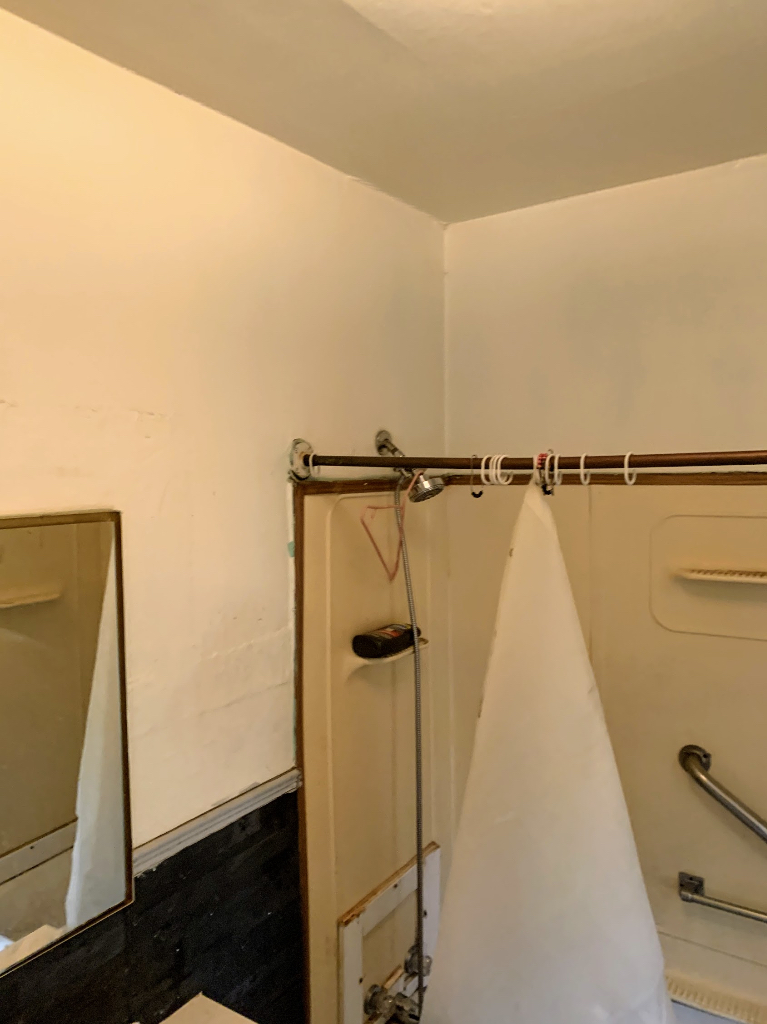 104 Pulaski Road Calumet City, IL 60409 - Photo 14 of 21 a view of walk in closet with clothes and window