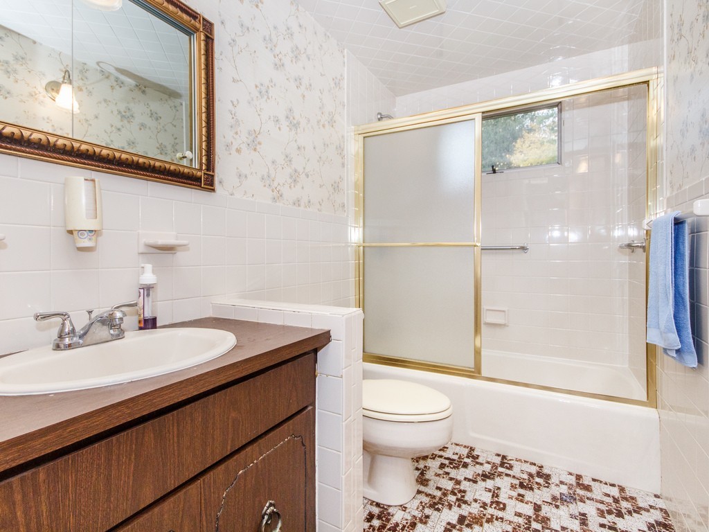 3 Trickett Road Lynnfield, MA 01940 - Photo 16 of 24 a bathroom with a sink a toilet and shower