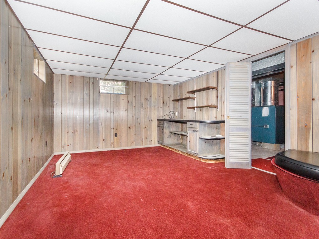 3 Trickett Road Lynnfield, MA 01940 - Photo 17 of 24 a view of empty room with cabinet and kitchen view