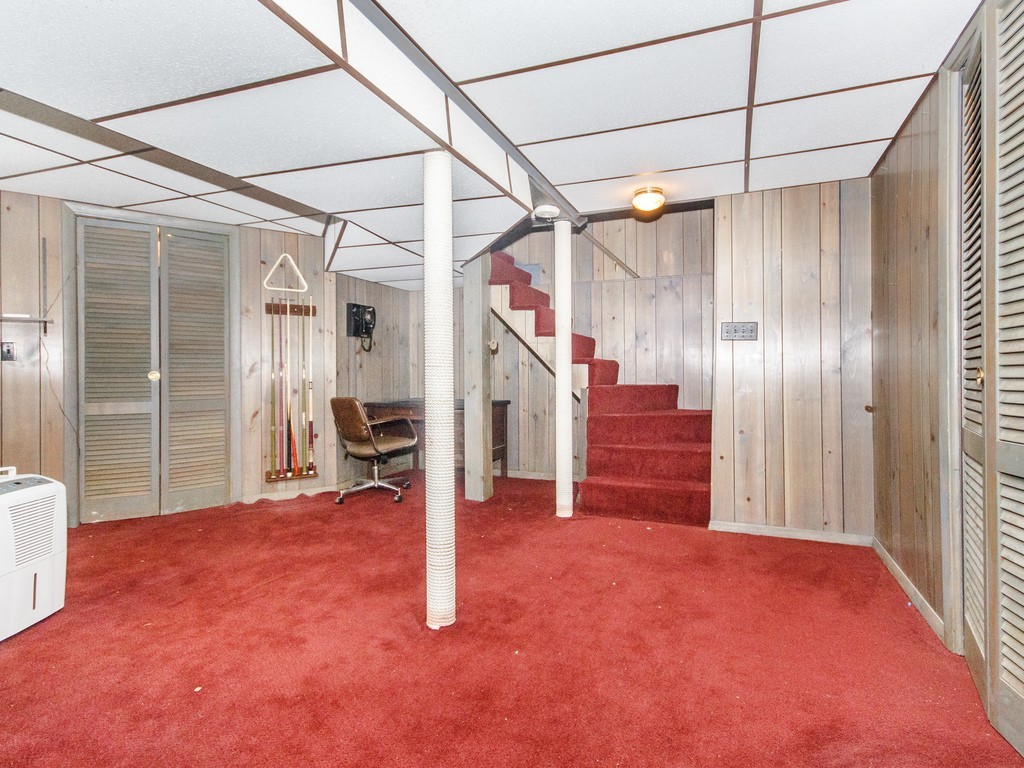 3 Trickett Road Lynnfield, MA 01940 - Photo 19 of 24 a view of a livingroom with wooden floor and stairs