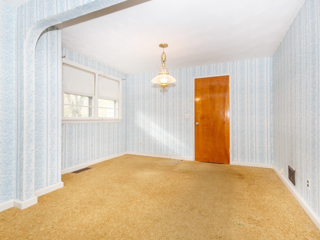 3 Trickett Road Lynnfield, MA 01940 - Photo 2 of 24 a view of a room with window and a chandelier