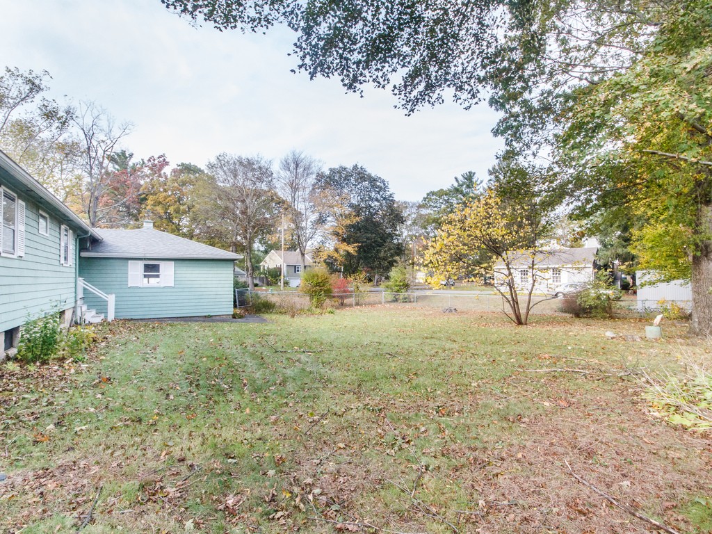 3 Trickett Road Lynnfield, MA 01940 - Photo 23 of 24 a view of a house with a yard
