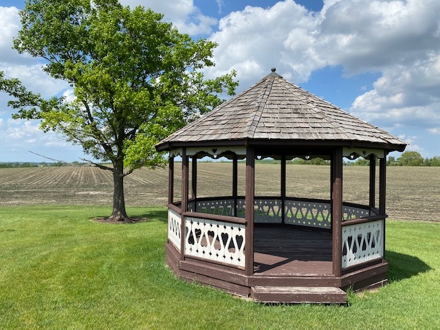 19720 Hebron Road Harvard, IL 60033 - Photo 11 of 41 a view of a house with backyard and porch