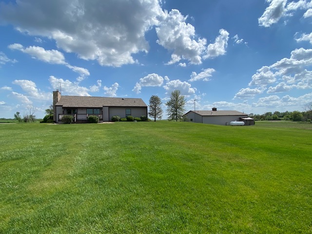 19720 Hebron Road Harvard, IL 60033 - Photo 13 of 41 a view of yard with swimming pool and green space