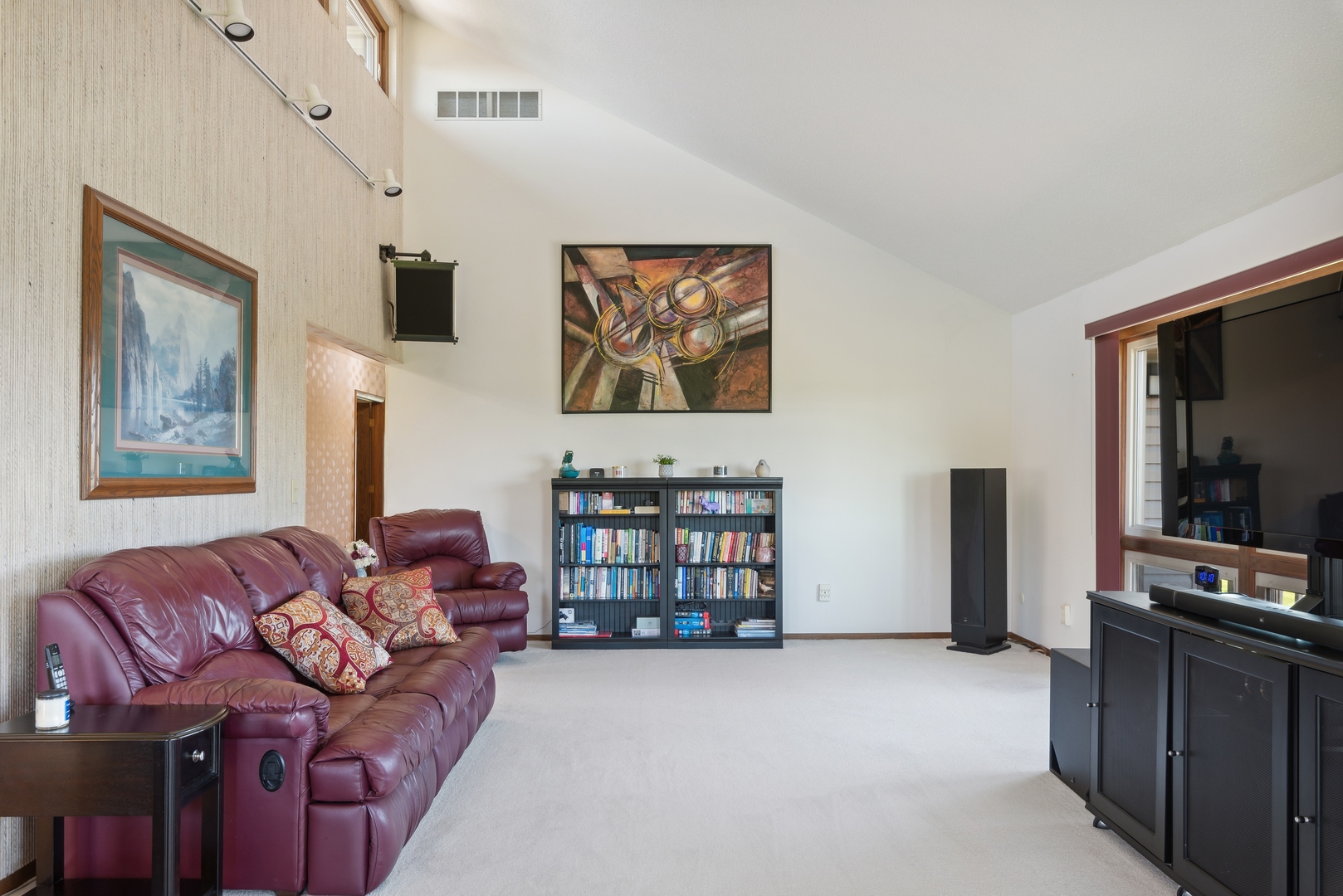 19720 Hebron Road Harvard, IL 60033 - Photo 16 of 41 a living room with furniture and a flat screen tv