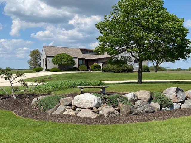 19720 Hebron Road Harvard, IL 60033 - Photo 2 of 41 a view of a golf course with chairs