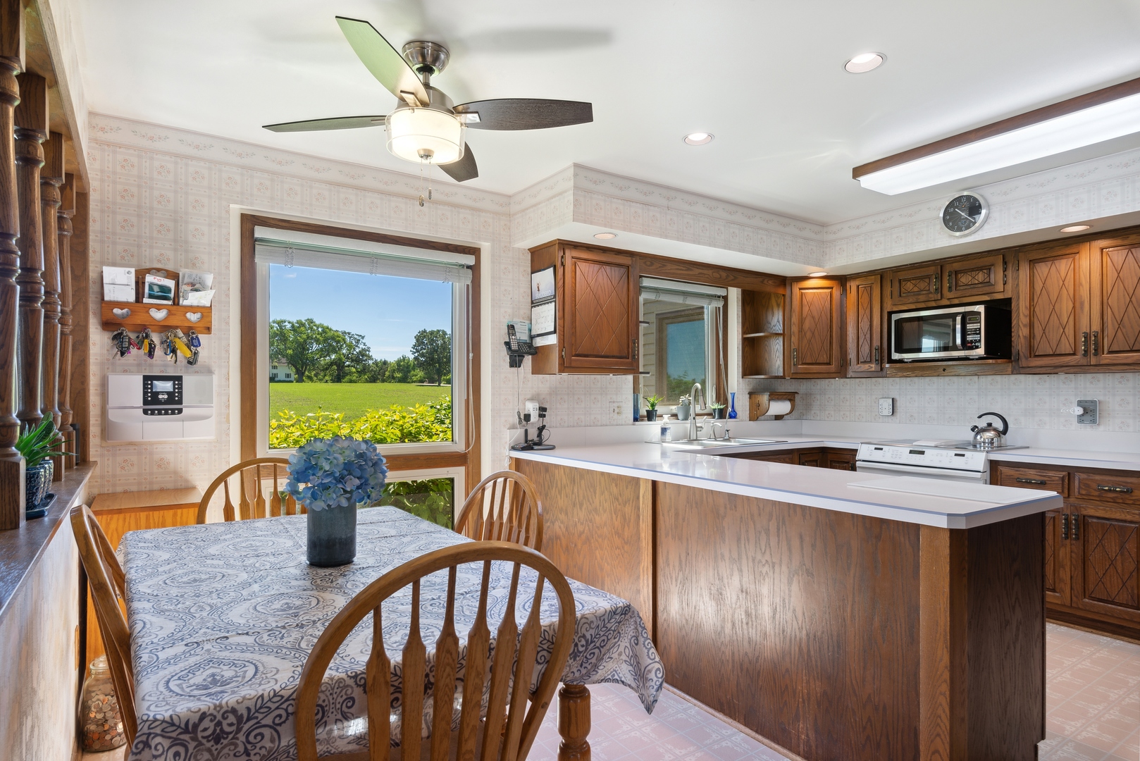 19720 Hebron Road Harvard, IL 60033 - Photo 21 of 41 a very nice looking dining room with furniture a kitchen and chandelier