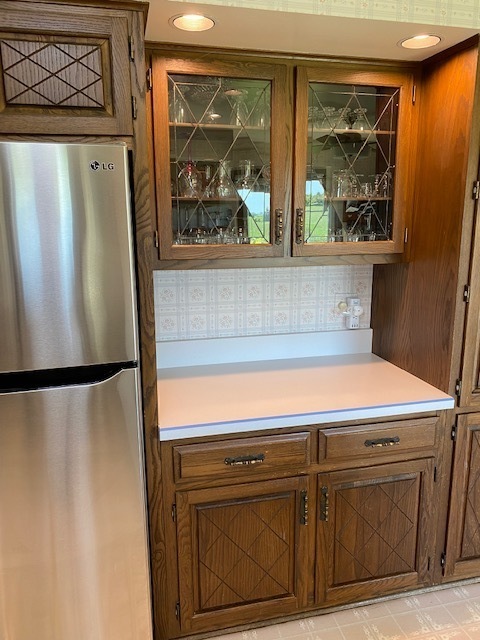 19720 Hebron Road Harvard, IL 60033 - Photo 23 of 41 a view of a kitchen with a refrigerator and a window
