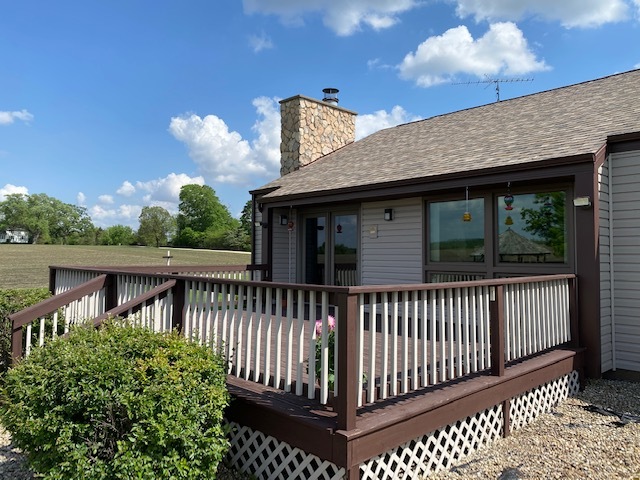 19720 Hebron Road Harvard, IL 60033 - Photo 29 of 41 a view of a brick house with a large window