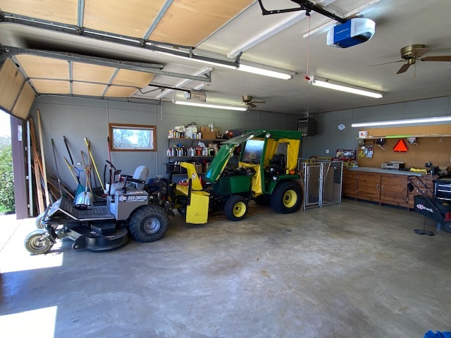 19720 Hebron Road Harvard, IL 60033 - Photo 32 of 41 a view of a garage with a bike and car