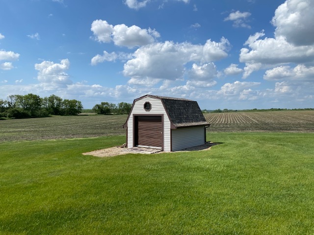 19720 Hebron Road Harvard, IL 60033 - Photo 39 of 41 a front view of a house with a garden