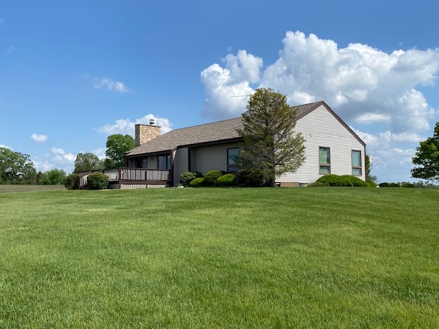 19720 Hebron Road Harvard, IL 60033 - Photo 4 of 41 a front view of house with an outdoor space and seating