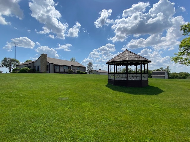 19720 Hebron Road Harvard, IL 60033 - Photo 7 of 41 a view of a garden with a slide