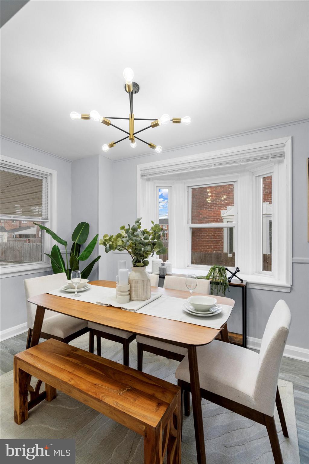 8411 Kavanagh Road Baltimore, MD 21222 - Photo 11 of 48 a dining room with furniture and window