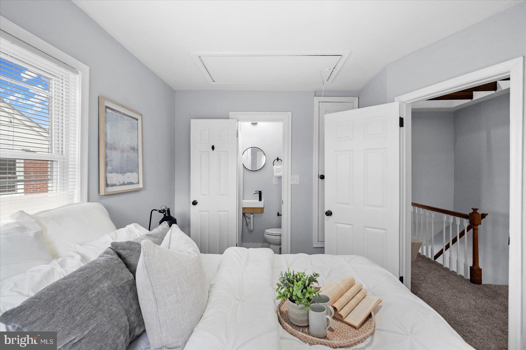 8411 Kavanagh Road Baltimore, MD 21222 - Photo 21 of 48 a living room with furniture and a floor to ceiling window