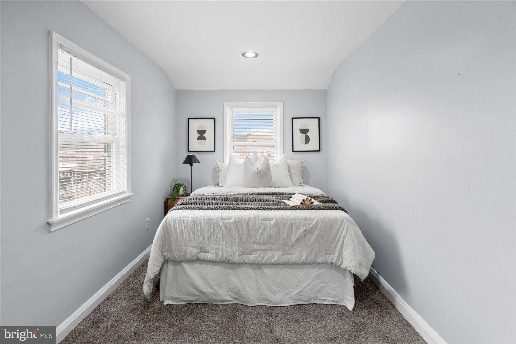 8411 Kavanagh Road Baltimore, MD 21222 - Photo 25 of 48 a bedroom with a bed and a window