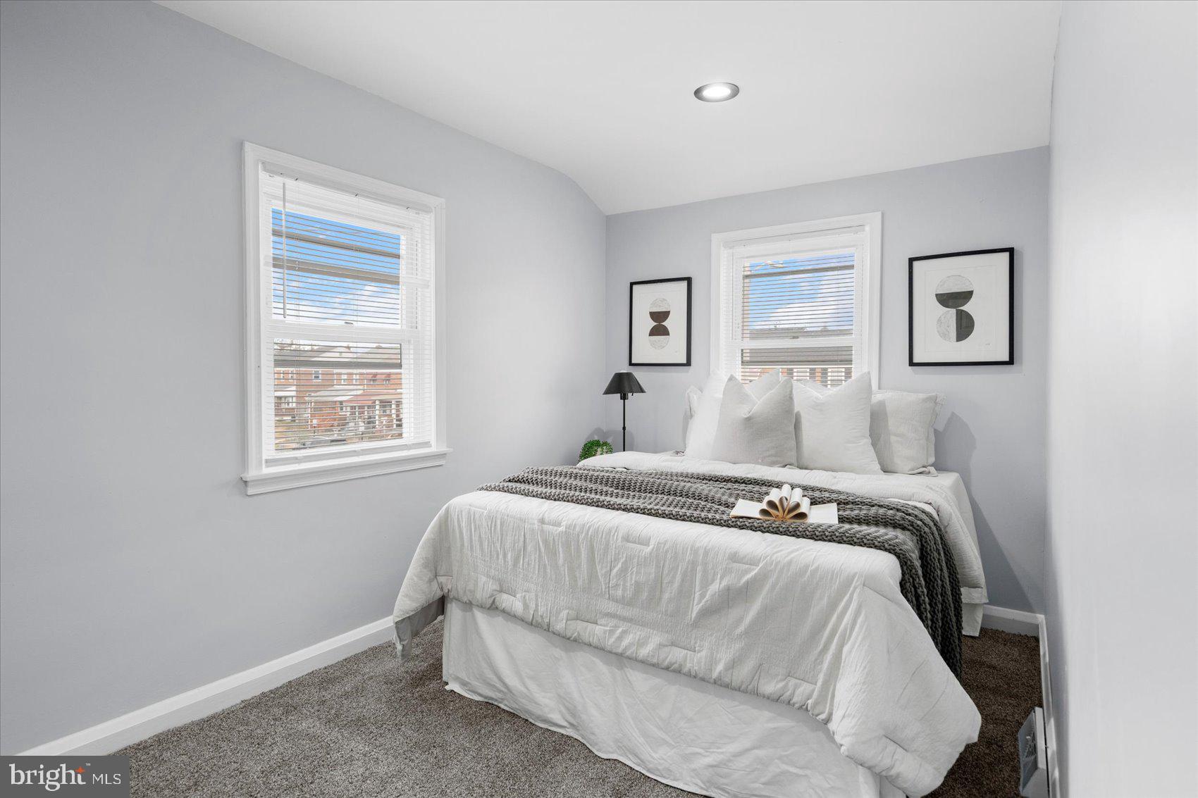 8411 Kavanagh Road Baltimore, MD 21222 - Photo 26 of 48 a bedroom with a bed and a window