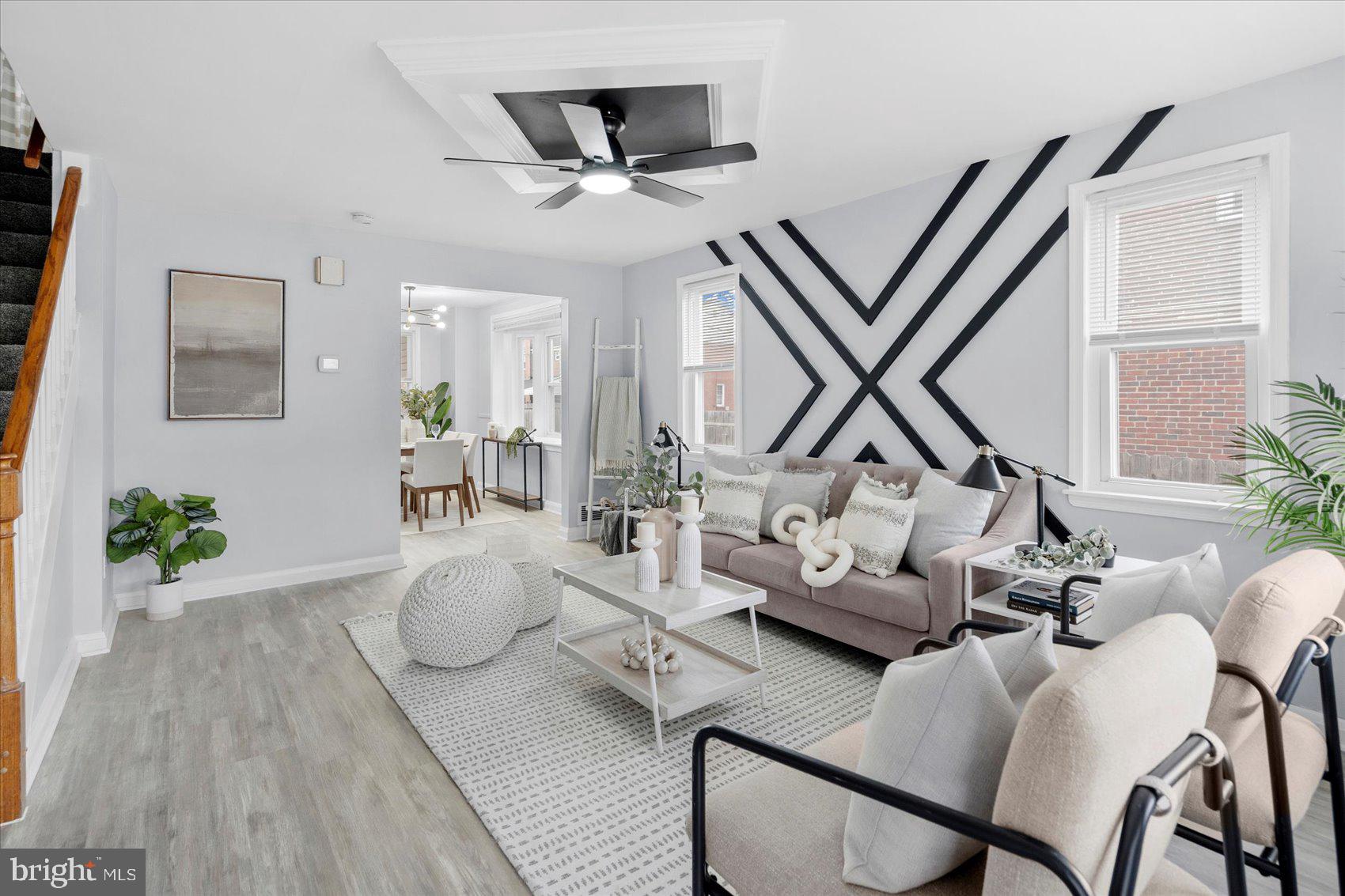 8411 Kavanagh Road Baltimore, MD 21222 - Photo 3 of 48 a living room with furniture and a wooden floor