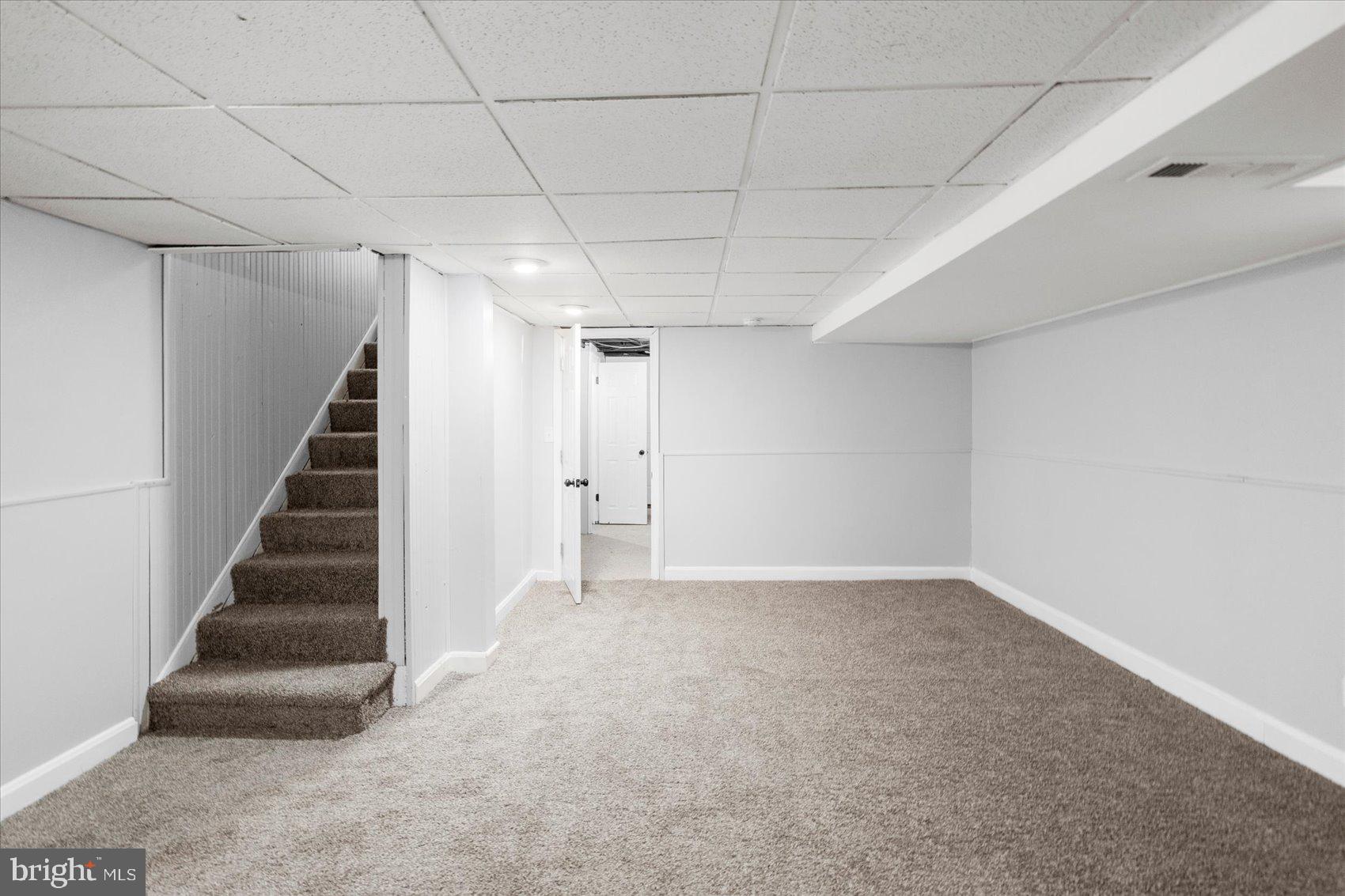 8411 Kavanagh Road Baltimore, MD 21222 - Photo 33 of 48 a view of an empty room with stairs