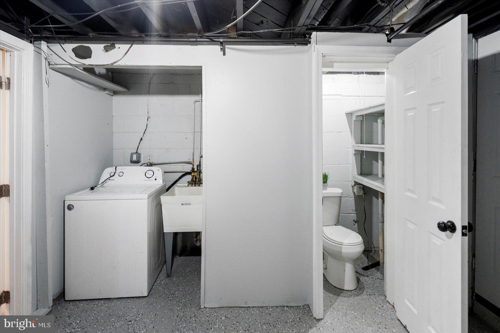 8411 Kavanagh Road Baltimore, MD 21222 - Photo 37 of 48 a utility room with dryer and washer