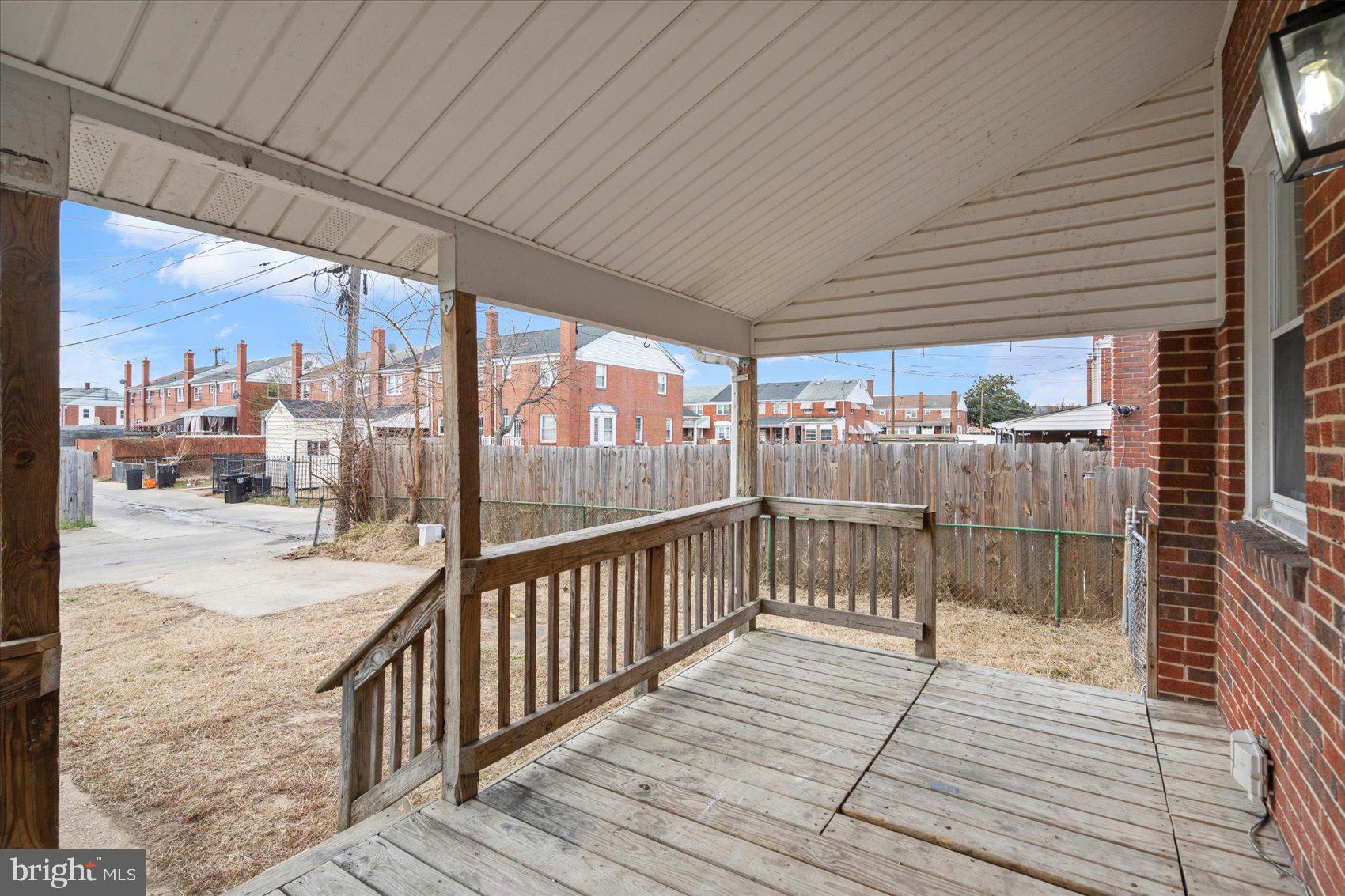 8411 Kavanagh Road Baltimore, MD 21222 - Photo 44 of 48 a view of a balcony with wooden floor