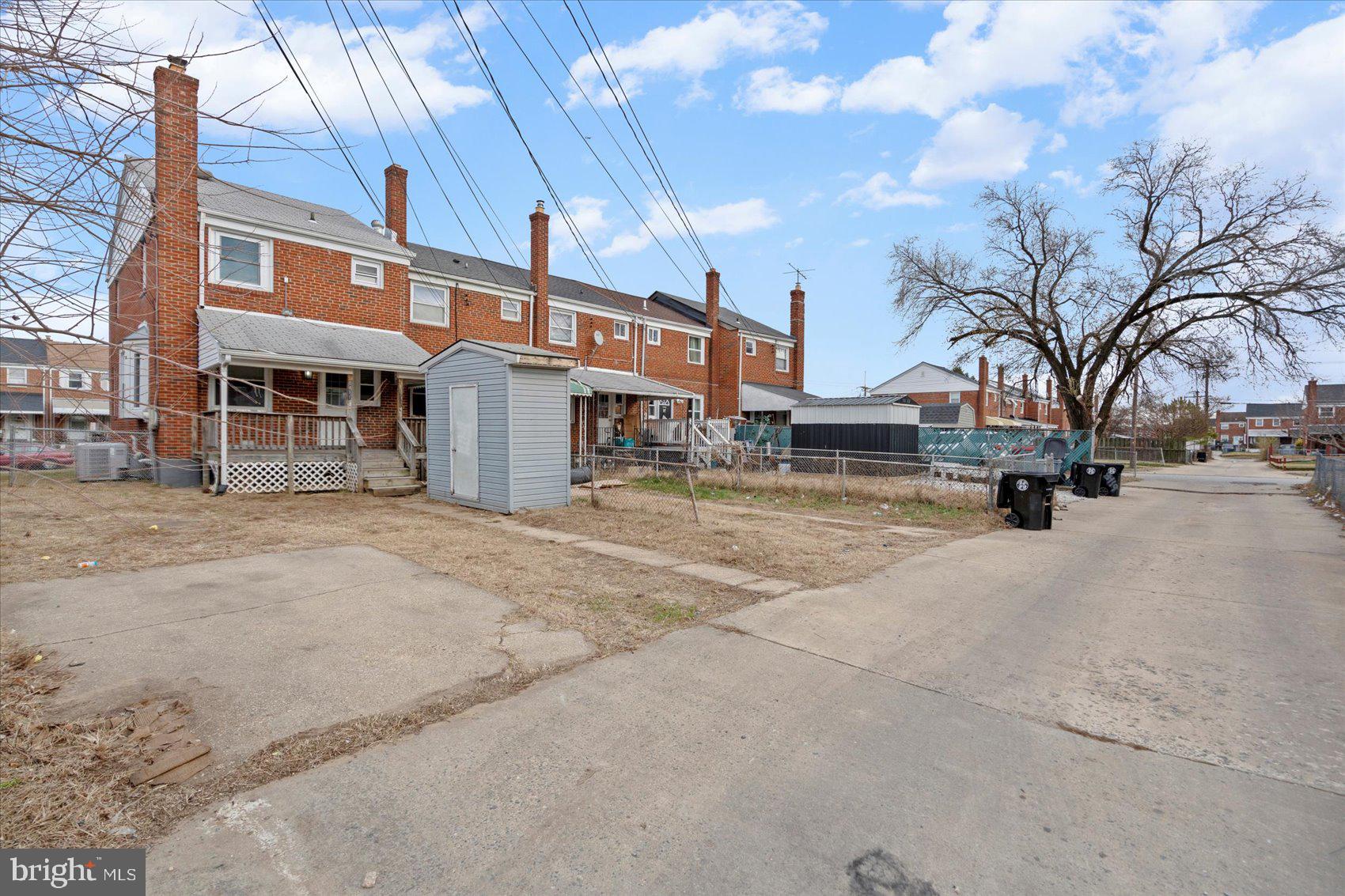 8411 Kavanagh Road Baltimore, MD 21222 - Photo 47 of 48 a row of houses with large trees