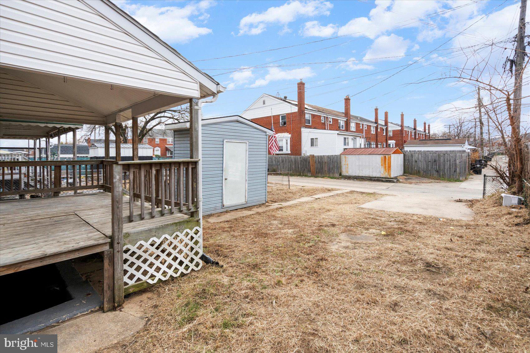 8411 Kavanagh Road Baltimore, MD 21222 - Photo 48 of 48 a view of a house with wooden fence