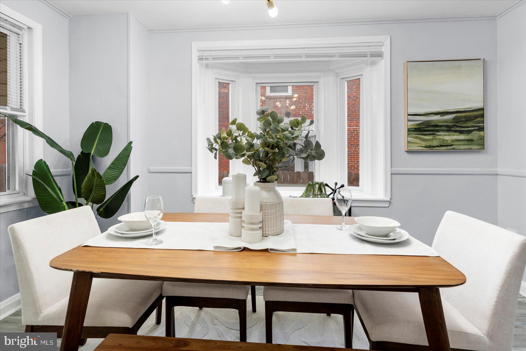 8411 Kavanagh Road Baltimore, MD 21222 - Photo 9 of 48 a dining room with furniture and wooden floor