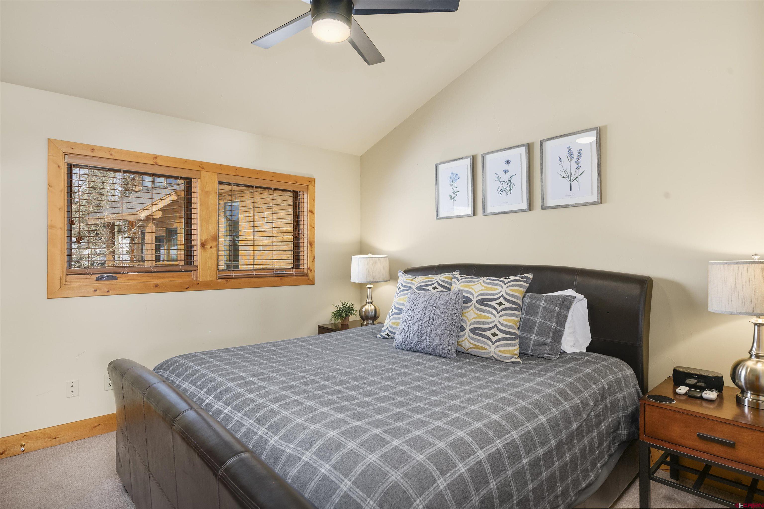 720 Gothic Road, Unit 3 Crested Butte, CO 81225 - Photo 16 of 29 a bedroom with bed and window