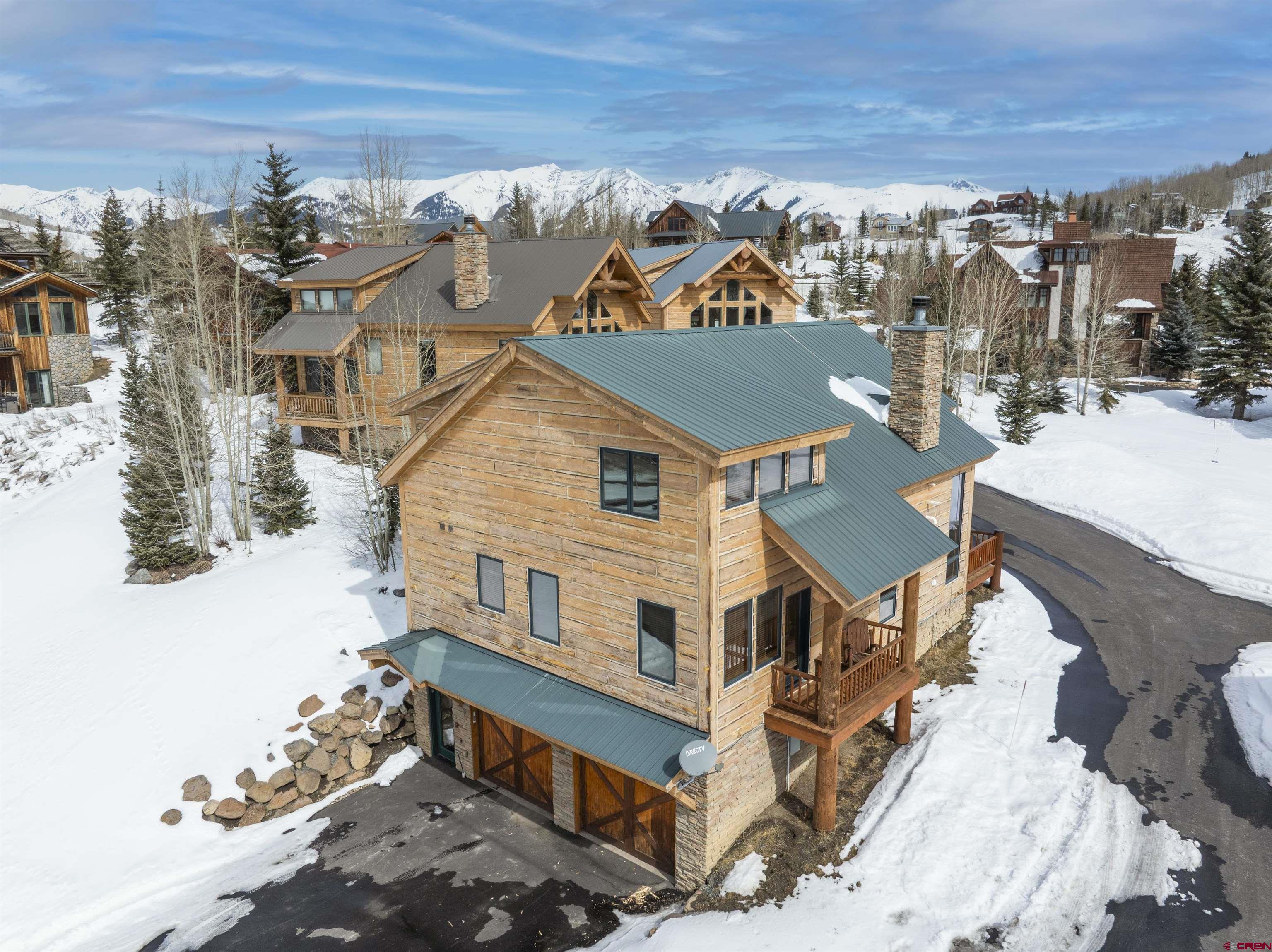 720 Gothic Road, Unit 3 Crested Butte, CO 81225 - Photo 26 of 29 a view of a house with wooden fence