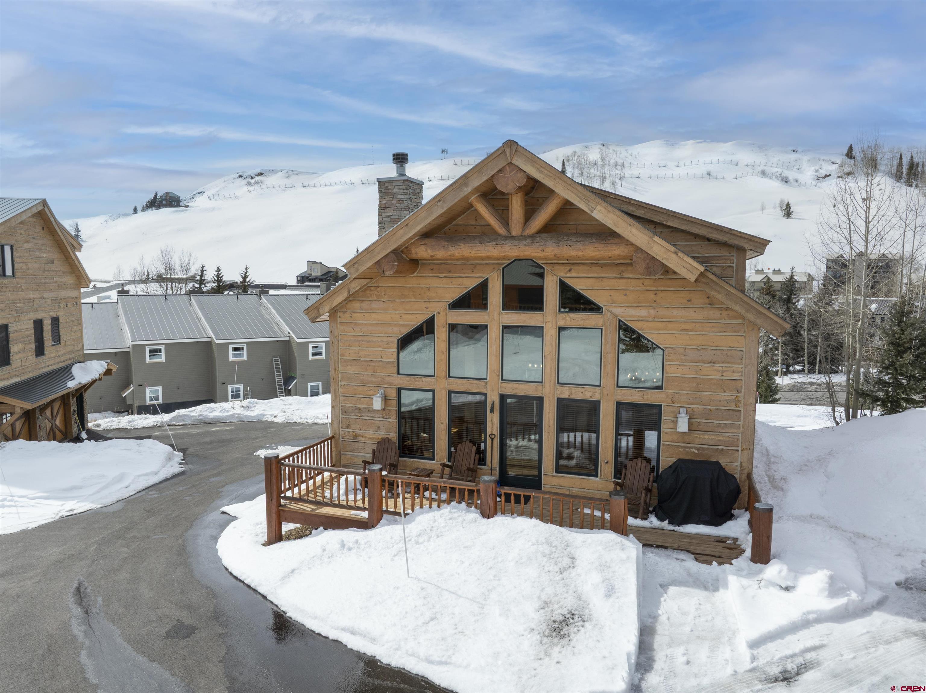 720 Gothic Road, Unit 3 Crested Butte, CO 81225 - Photo 27 of 29 a view of a house with a yard