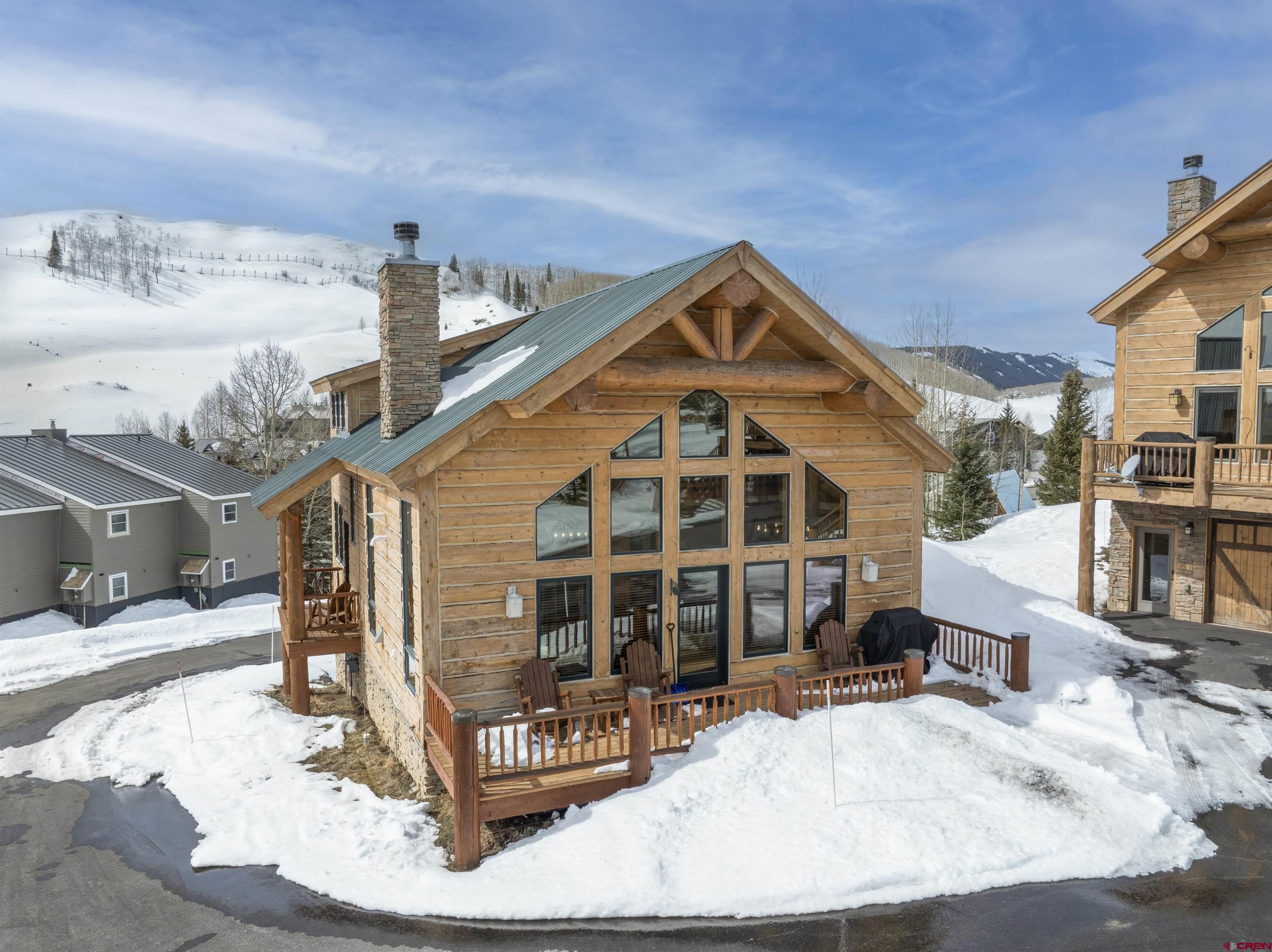 720 Gothic Road, Unit 3 Crested Butte, CO 81225 - Photo 28 of 29 a view of a house with a wooden deck