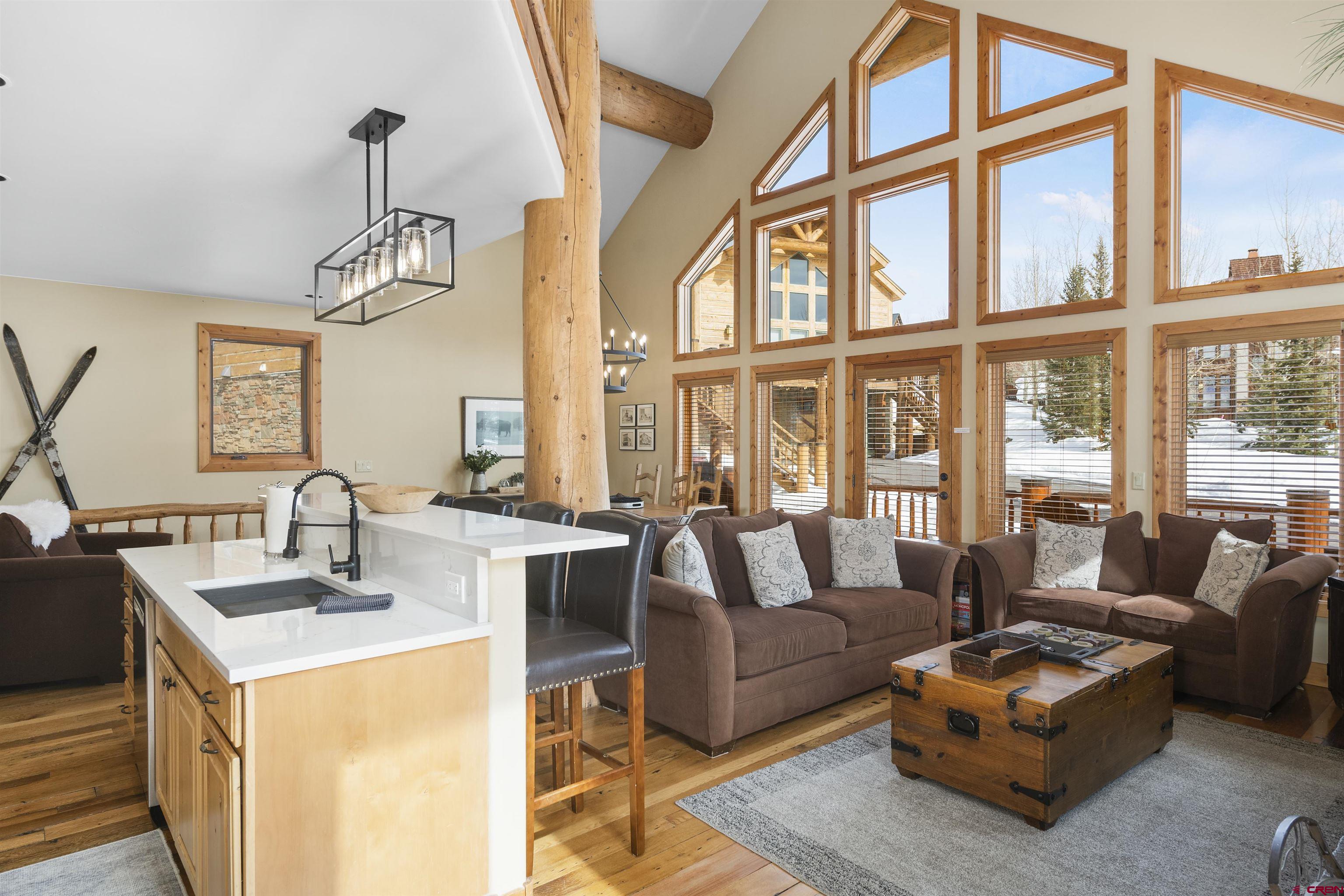 720 Gothic Road, Unit 3 Crested Butte, CO 81225 - Photo 4 of 29 a living room with furniture and a window