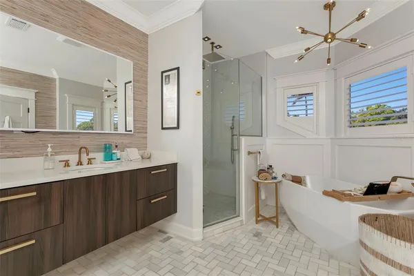 a bathroom with a sink and a bathtub