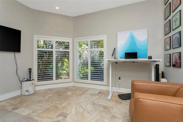 a view of swimming pool with a lounge chair