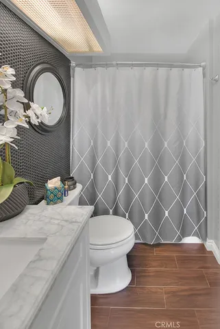 a balcony with furniture and a window