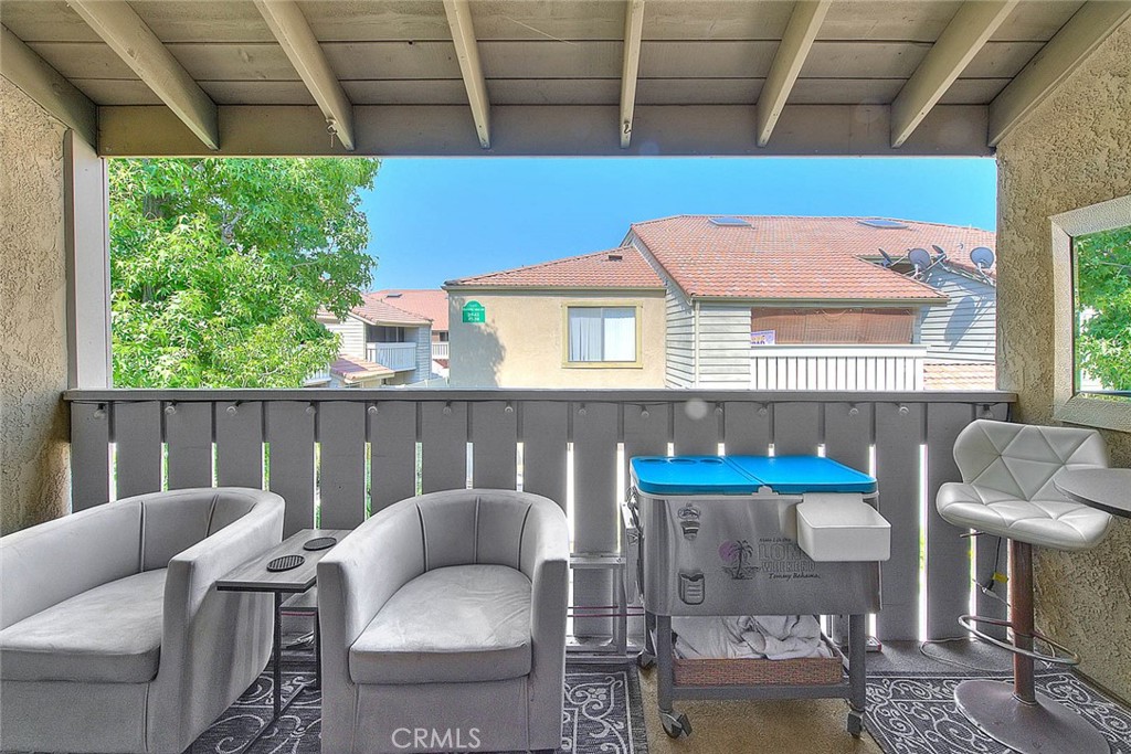 44 Carriage Way, Unit 108 Pomona, CA 91766 - Photo 39 of 44 a balcony with furniture and a window