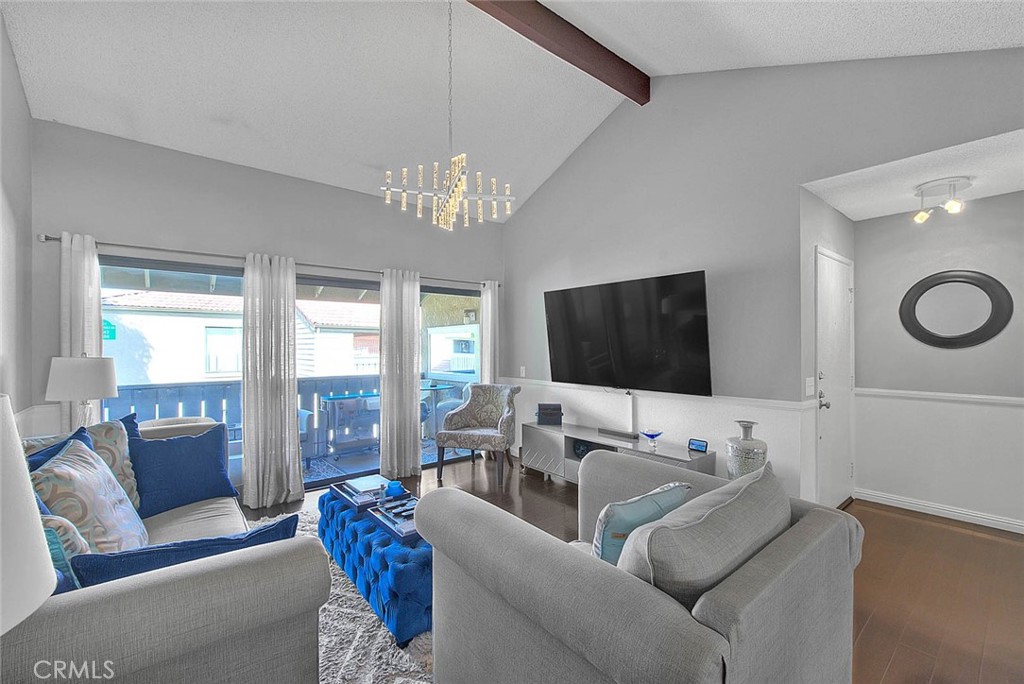 44 Carriage Way, Unit 108 Pomona, CA 91766 - Photo 5 of 44 a living room with furniture and a flat screen tv