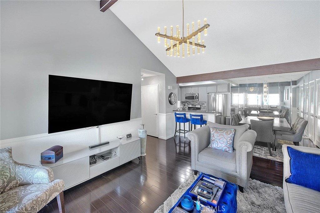 44 Carriage Way, Unit 108 Pomona, CA 91766 - Photo 8 of 44 a living room with furniture and a flat screen tv