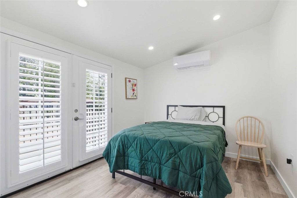 301 West Ashby Street Azusa, CA 91702 - Photo 64 of 75 a bedroom with a bed and a window
