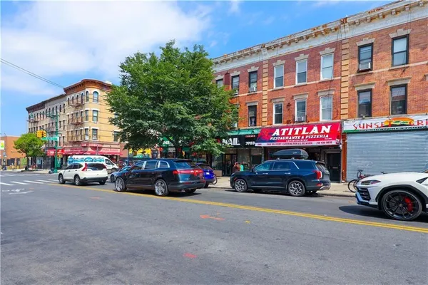 a view of a car parked in front of a building