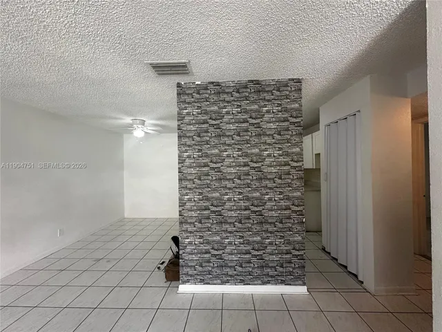 a bathroom with a sink toilet and mirror