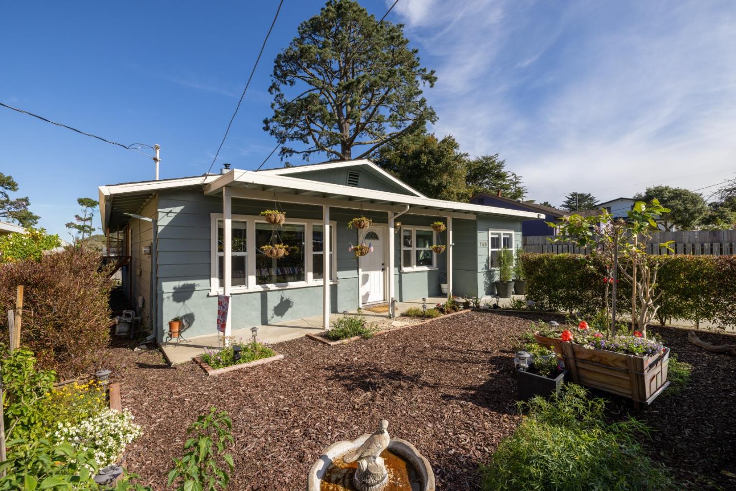 748 Alice Street Monterey, CA 93940 - Photo 1 of 36 a front view of a house with garden
