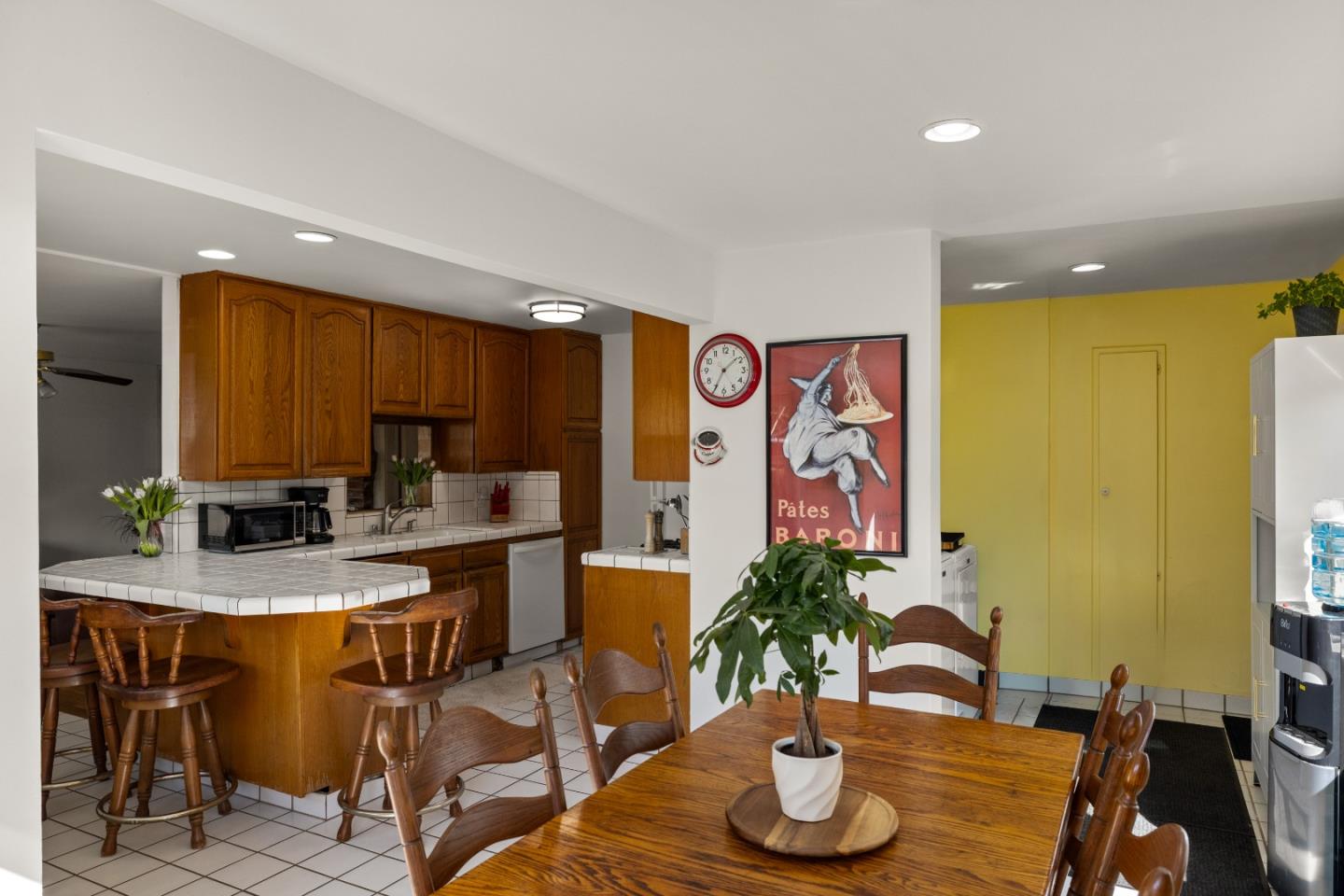 748 Alice Street Monterey, CA 93940 - Photo 17 of 36 a view of a dining room with furniture one side and wooden floor