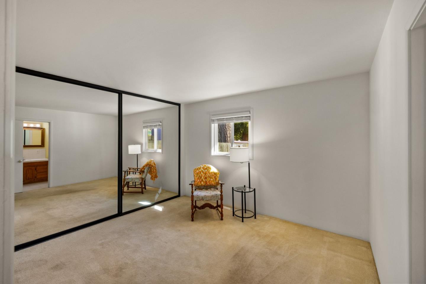 748 Alice Street Monterey, CA 93940 - Photo 22 of 36 a bedroom with furniture and a window