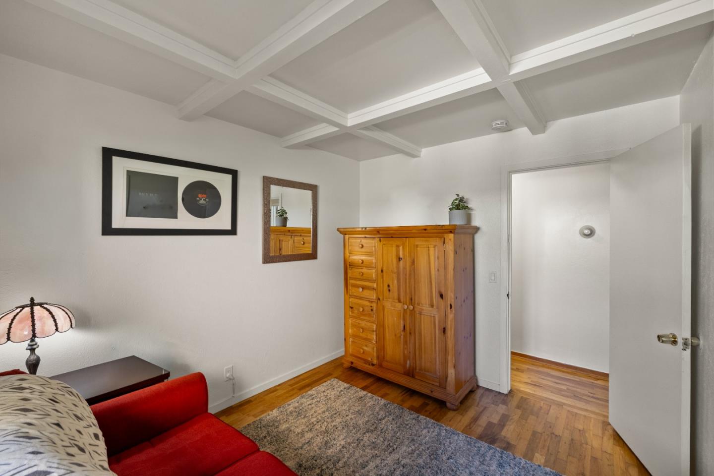 748 Alice Street Monterey, CA 93940 - Photo 26 of 36 a bedroom with furniture and wooden floor