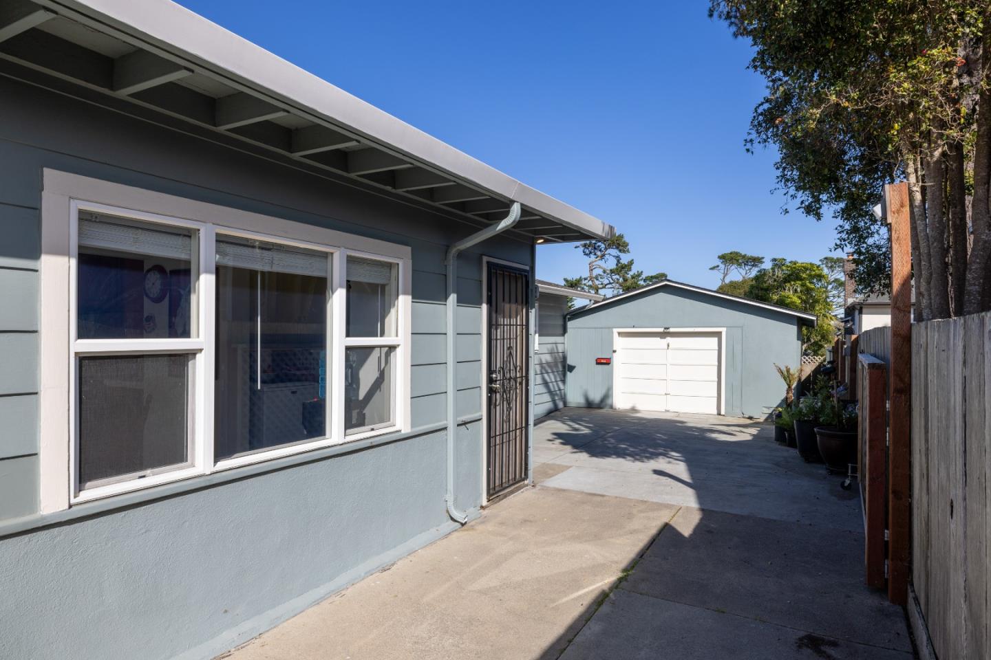 748 Alice Street Monterey, CA 93940 - Photo 27 of 36 a front view of a house with a yard