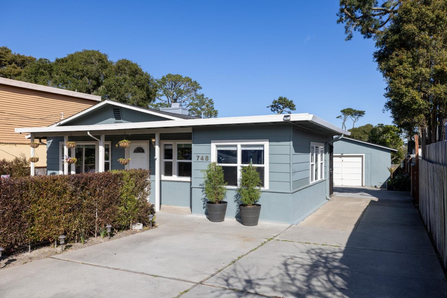 748 Alice Street Monterey, CA 93940 - Photo 34 of 36 a front view of a house with garden